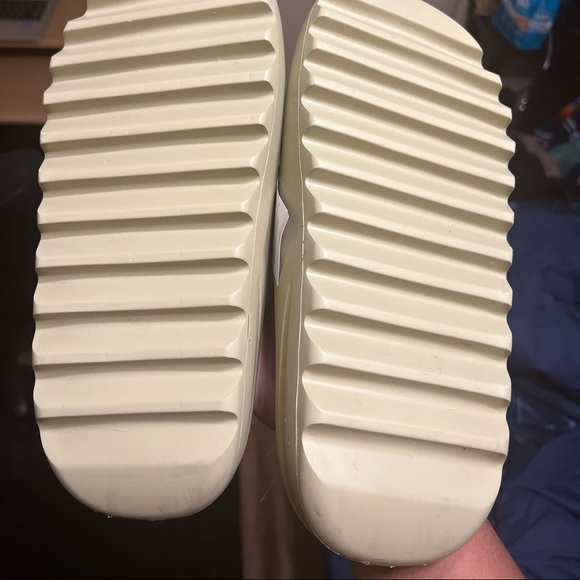 Yeezy slides never worn , have extra pair.  Will ship main image 5
